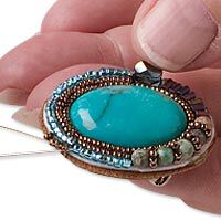 Step 19 - Stitch leather to beadwork
